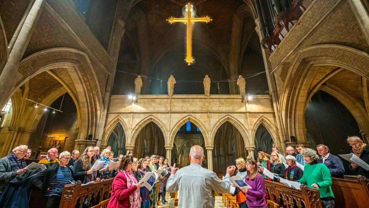 Choir singing in a church,.