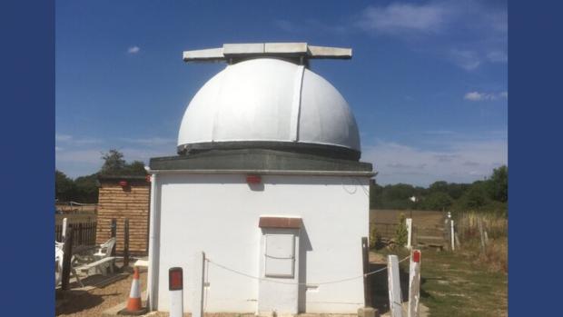 Observatory on a clear day with blue sky