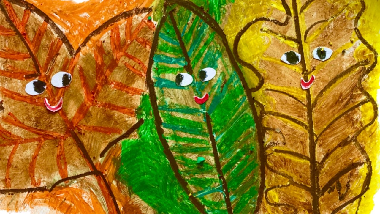 Graphic with three leaves in autumnal colours.