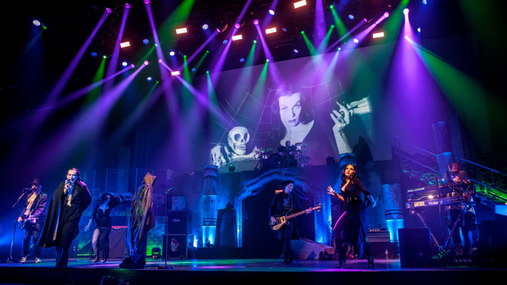 Photo of The Damned on stage. 