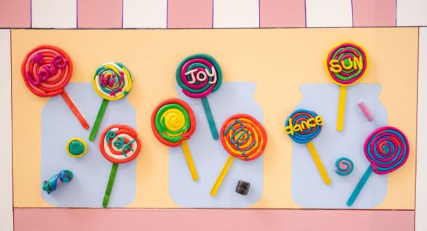 An artwork featuring colourful lollipops