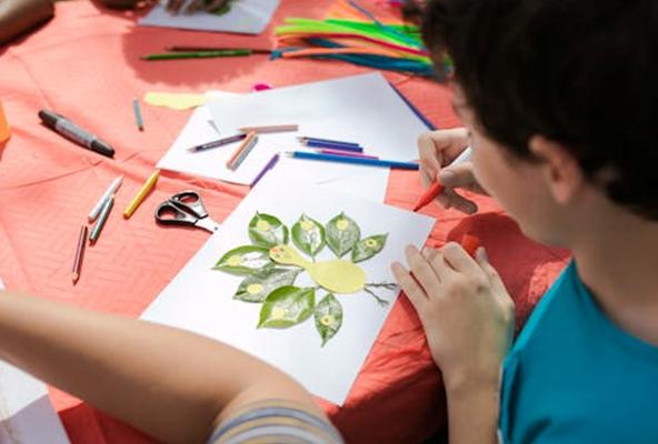 a young person making art