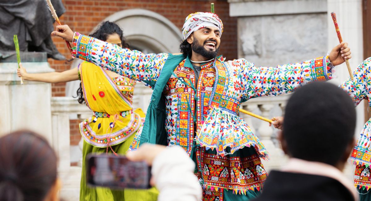 Dance performer in vibrant costume in Croydon