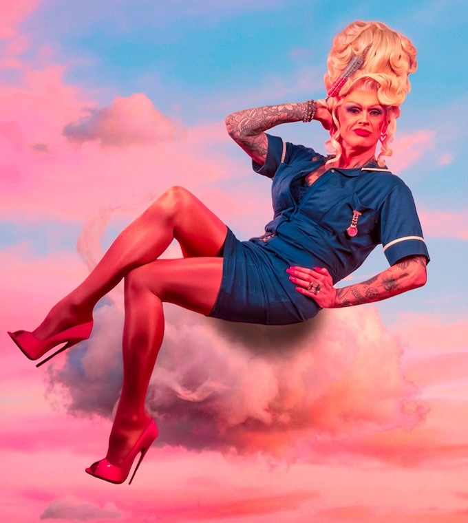 Sister Brandy Bex sitting on a pink cloud